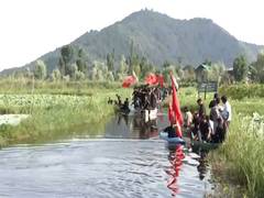 
      
      Muharram procession taken out in boats on Dal Lake in Srinagar
      
      