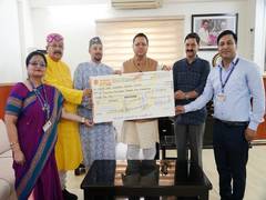 
      
      MUSS hands over cheque to Shri Badrinath Kedarnath Temple
      
      
