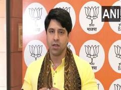 
      
      BJP's Poonawalla slams Rahul for being 