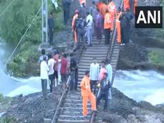 
      
      Gujarat: Restoration work continues on waterlogged Porbandar rail
      
      