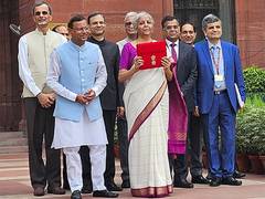 
      
      FM Nirmala Sitharaman heads to Rashtrapati Bhavan
      
      