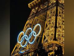 
      
      Eiffel Tower lit up in Olympic colours ahead of opening ceremony
      
      