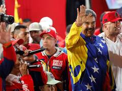 
      
      Venezuela: Both Maduro, Opposition claim victory in polls
      
      