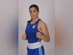 
      
      Boxer who failed gender test secures controversial win at Paris
      
      