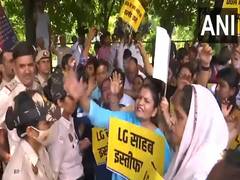 
      
      AAP holds protest at LG office, demands resignation, after woman
      
      