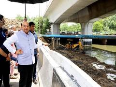 
      
      Delhi LG VK Saxena visits, inspects drains and water flows
      
      