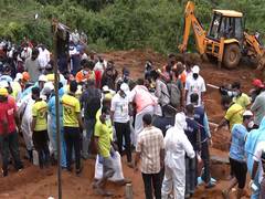 
      
      Wayanad: Administration conducts mass burial of unidentified vict
      
      