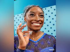 
      
      Paris Olympics: Simone Biles secures silver in floor exercise
      
      
