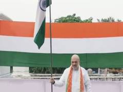 
      
      Union Home Minister Amit Shah hoists Tricolour at his residence 
      
      