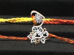 
      
      Surat dazzles with diamond, gold and silver rakhis
      
      