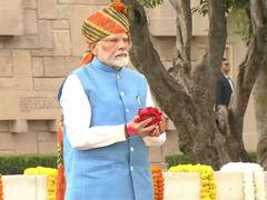 
      
      PM Modi arrives at Rajghat, pays tribute to Mahatma Gandhi
      
      