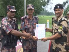 
      
      Indian, Bangladeshi border forces exchange sweets on 78th I-Day
      
      