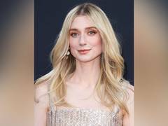
      
      Elizabeth Debicki says 'The Crown' 