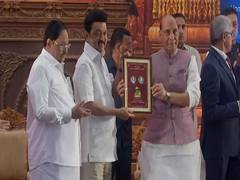
      
      Rajnath Singh releases commemorative coin
      
      