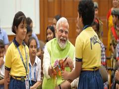 
      
      PM Modi celebrates Raksha Bandhan with school girls in Delhi
      
      