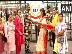 
      
      BSF jawans celebrate 'Raksha Bandhan' at Attari-Wagah border
      
      