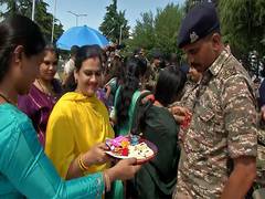 
      
      J-K: CRPF jawans celebrate Raksha Bandhan at Srinagar airport
      
      