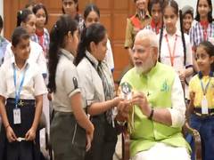 
      
      Students tie ‘Ek Ped Maa Ke Naam’ theme-based Rakhi to PM Modi
      
      