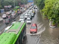
      
      Commuters in Delhi face traffic congestion amid heavy rains
      
      