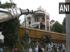 
      
      Crane falls onto building during metro construction work in Surat
      
      