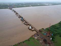 
      
      1.4 km bridge over Narmada making swift progress 
      
      