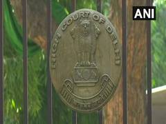 
      
      Unauthorised Construction of shops in temple stopped after court'
      
      