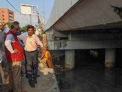 
      
      Delhi LG visits INA drain; instructs officials to desilt, clean
      
      