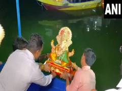 
      
      Maharashtra CM Shinde participates in Ganesh idol immersion event
      
      