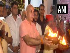 
      
      Manish Sisodia offers prayer at Ganesh Puja Pandal in Patparganj 
      
      