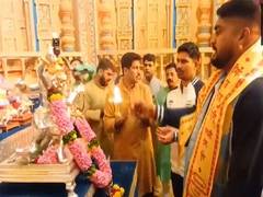 
      
      Sachin Sarjerao Khilari offers prayers after winning silver
      
      