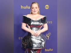 
      
      Nicola Coughlan wows in a silver off-the-shoulder gown
      
      