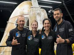 
      
      Entrepreneur returns to Earth after historic spacewalk
      
      