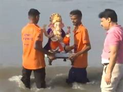 
      
      Maharashtra: People participate in Ganpati Visarjan in Mumbai
      
      
