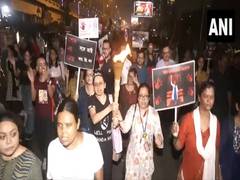 
      
      People takes out torch rally demanding justice for trainee doctor
      
      