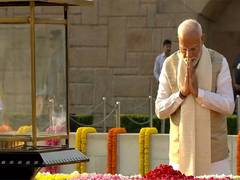 
      
      PM Modi pay floral tributes to Mahatma Gandhi at Rajghat
      
      