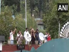 
      
      Farooq Abdullah greets his supporters as latest trend shows NC-Co
      
      