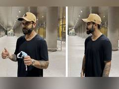 
      
      Virat Kohli cutely allows paps to take his pictures at airport
      
      