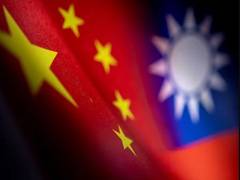 
      
      China probes Taiwanese employees on charges of bribes
      
      