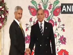 
      
      EAM Jaishankar, Pak PM Sharif shake hands ahead of SCO summit
      
      