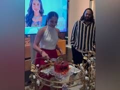 
      
      Radhika Merchant stuns in red and white outfit at her b'day bash
      
      