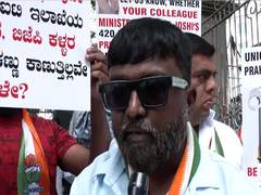 
      
      Congress protests demanding Joshi's dismissal and arrest of kin 
      
      