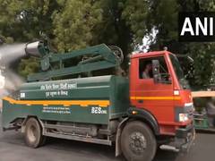
      
      PWD vehicles sprinkle water in parts Delhi to curb Pollution
      
      