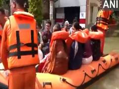 
      
      Bengaluru: NDRF rescues residents of Kendriya Vihar Apt in boats
      
      