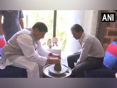 
      
      CM prepares diya to promote potters’ traditional art for Diwali 
      
      