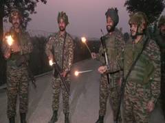 
      
      Army jawans celebrate Diwali at LoC in Jammu
      
      