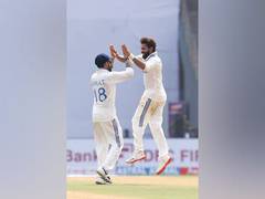 
      
      Mitchell resists Jadeja's spin as India look to clean up NZ
      
      