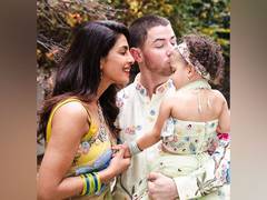 
      
      Priyanka Chopra, Nick Jonas, daughter Malti Marie shine in...
      
      