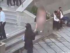 
      
      Iranian women detained after stripping to protest strict dress co
      
      