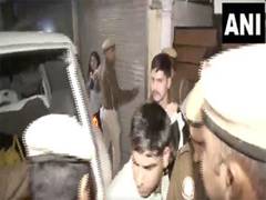 
      
      Delhi Police detains bus marshal who threw 
