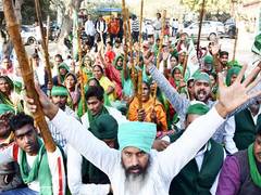 
      
      34 farmers detained for holding protest without permission
      
      